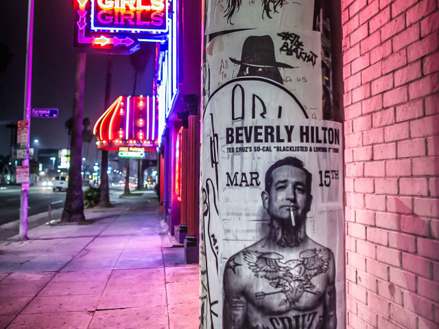 Ted Cruz reacts to his smoking shirtless street art poster