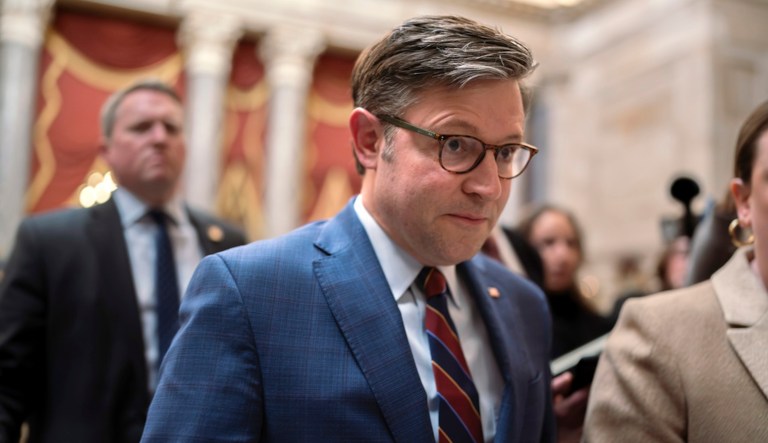 House Speaker Mike Johnson (R-LA) maneuvers past reporters asking about the Senate supplemental while arriving in the Capitol, in Washington, Monday, Feb. 5, 2024. (AP Photo/J. Scott Applewhite)