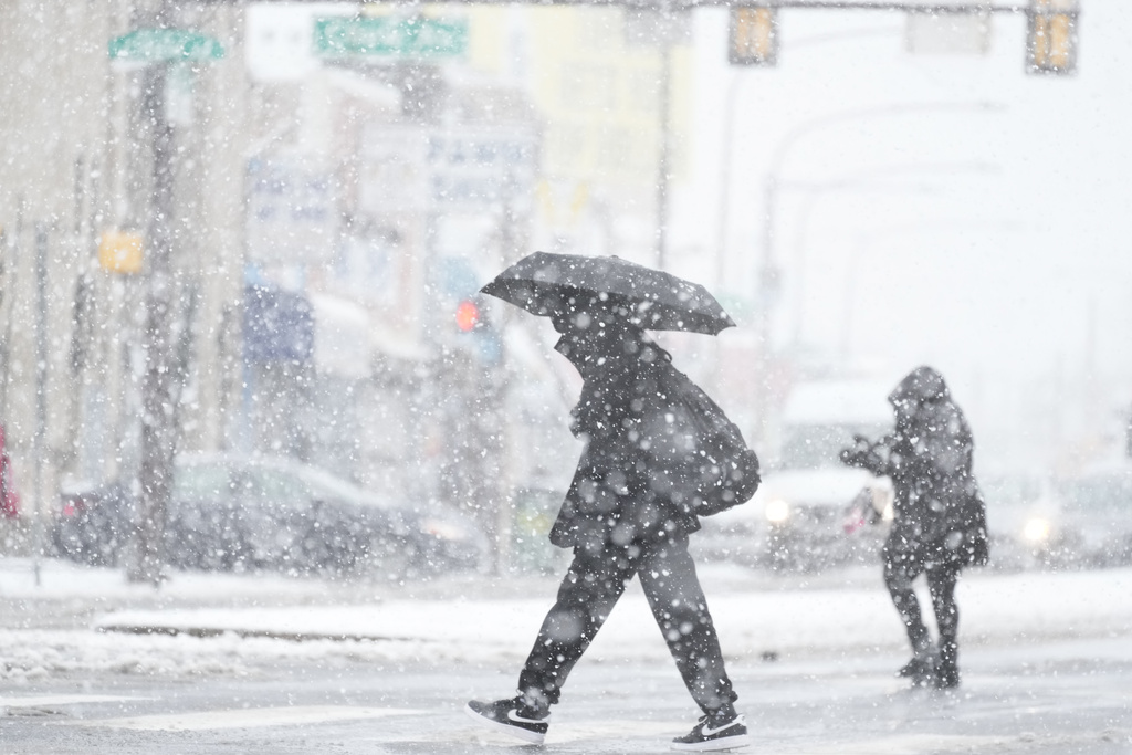 Winter storm snarls holiday travel across Northeast, Great Lakes