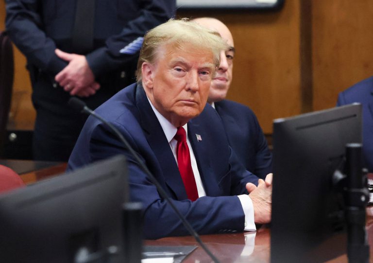 Former President Donald Trump appears during a court hearing at Manhattan criminal court, Thursday, Feb. 15, 2024, in New York. A New York judge says Trump's hush-money trial will go ahead as scheduled with jury selection starting on March 25. (Brendan McDermid/Pool Photo via AP)