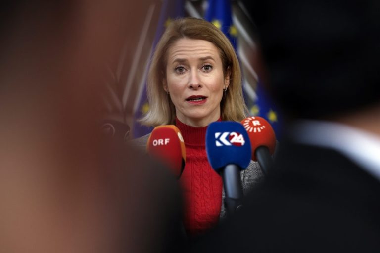 Estonia's then-Prime Minister Kaja Kallas talks to journalists as she arrives for an EU summit in Brussels, on Feb. 1, 2024. Russia has put Kallas on a wanted list, an official register showed Feb. 13, 2024, a move that comes amid soaring Russia-West tensions over Ukraine. (AP Photo/Omar Havana)