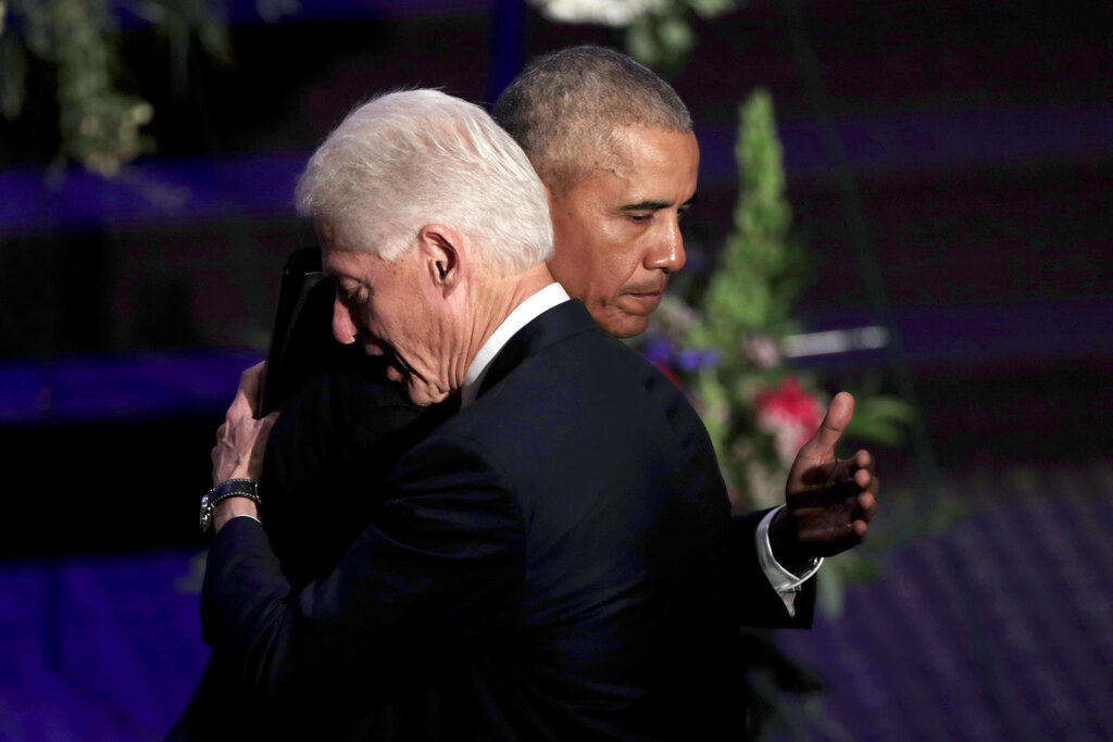 Obama and Clinton look to boost Biden without overshadowing him