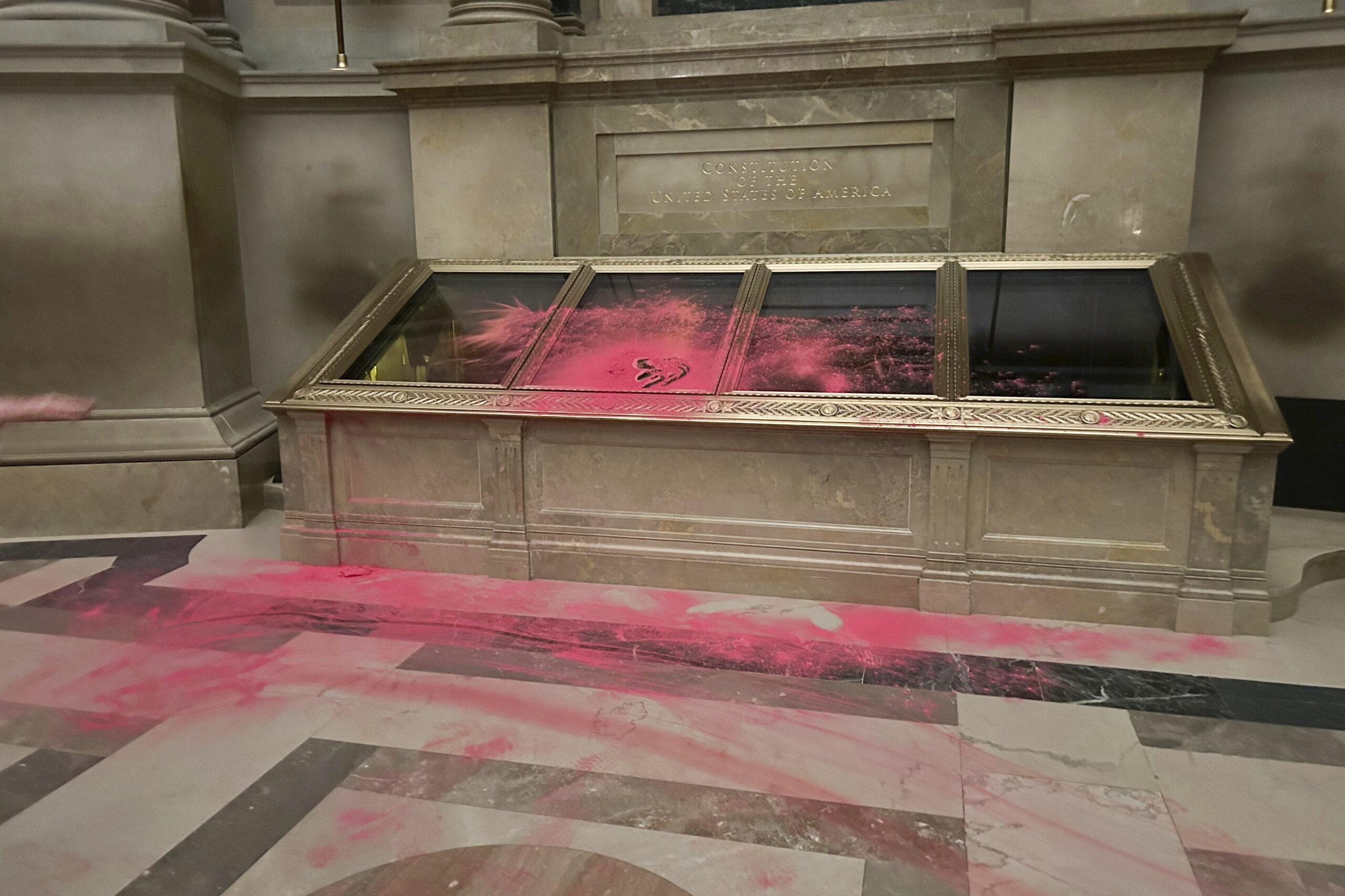 Protesters face $50,000 fine for red powder attack on the Constitution