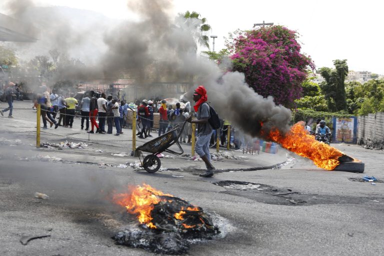 Haitian prime minister to resign with multinational forces deploying as quickly as possible