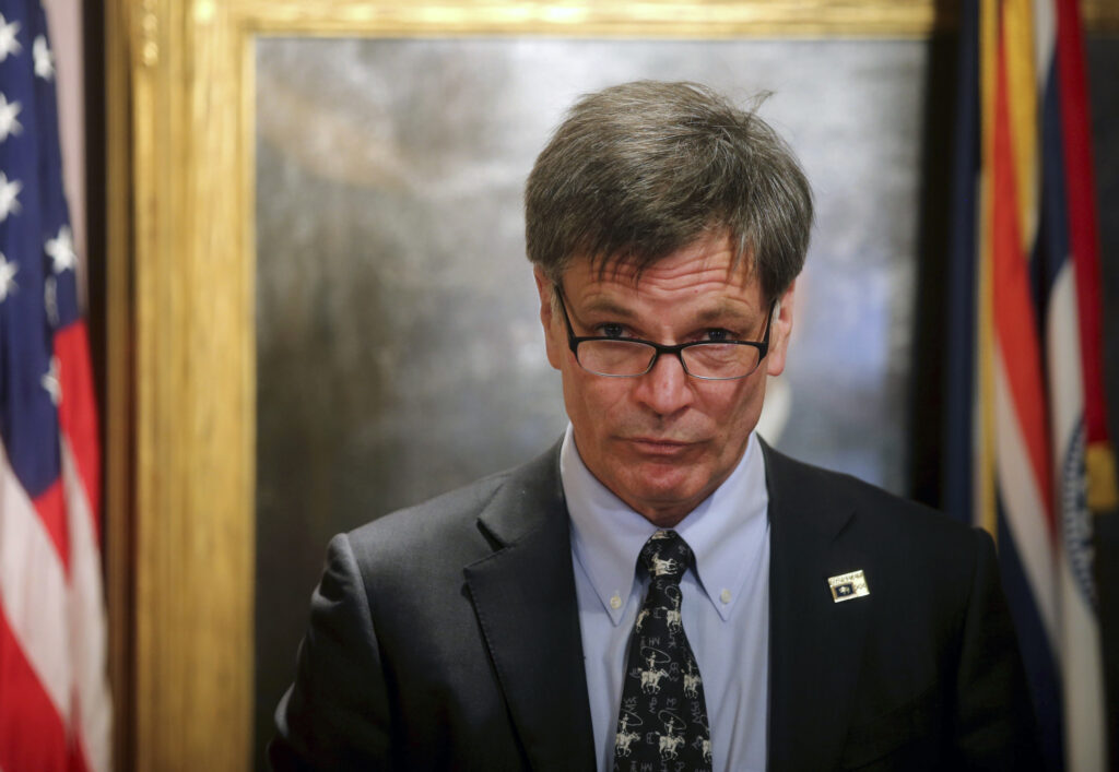 FILE - Wyoming Gov. Mark Gordon speaks during a news conference in Cheyenne, Wyo., Monday, June 3, 2019. Gordon, on Friday, March 22, 2024, vetoed a bill that would have repealed certain gun-free zones, allowing people to carry concealed firearms in schools and government meetings. (Jacob Byk/The Wyoming Tribune Eagle via AP, File)