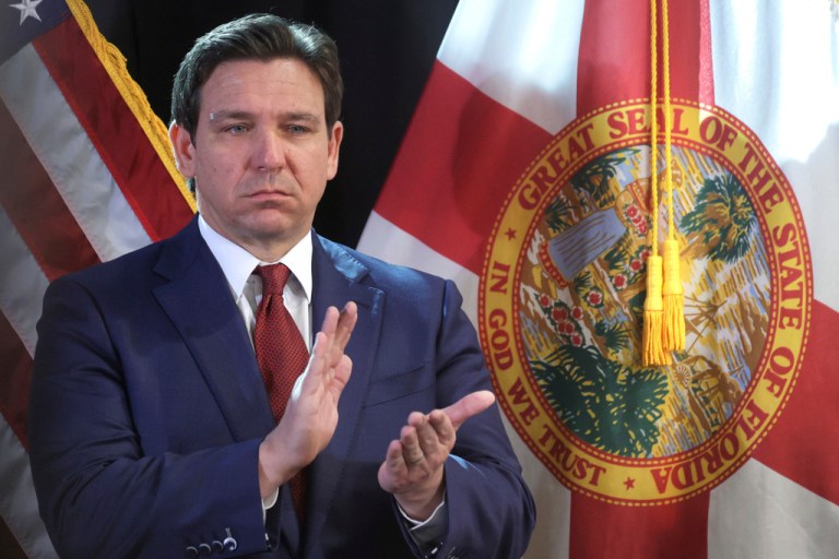 Florida Gov. Ron DeSantis applauds during a press conference at the Central Florida Tourism Oversight District headquarters at Walt Disney World, in Lake Buena Vista, Fla., Thursday, Feb. 22, 2024. Florida will have one of the country's most restrictive social media bans for minors — if it withstands expected legal challenges — under a bill signed by Republican Florida Gov. Ron DeSantis on Monday, March 25, 2024. (Joe Burbank/Orlando Sentinel via AP, File)