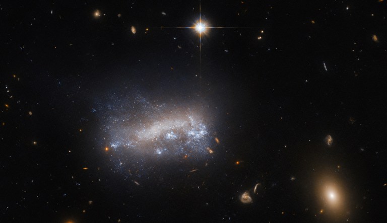 NASA releases Hubble image of galaxy under pressure