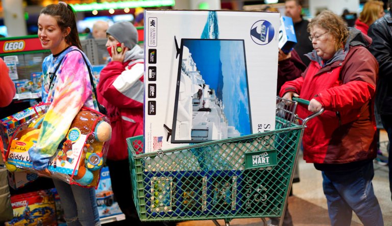 Shoppers. Consumer sentiment hit the highest level in years amid falling inflation.