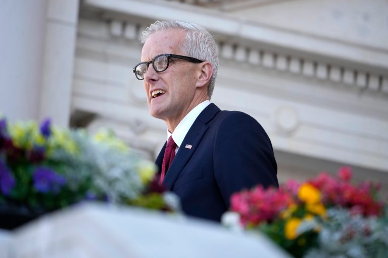 Former Veterans Affairs Secretary Denis McDonough speaks before former President Joe Biden at the National Veterans Day Observance at the Memorial Amphitheater at Arlington National Cemetery in Virginia, Saturday, Nov. 11, 2023.