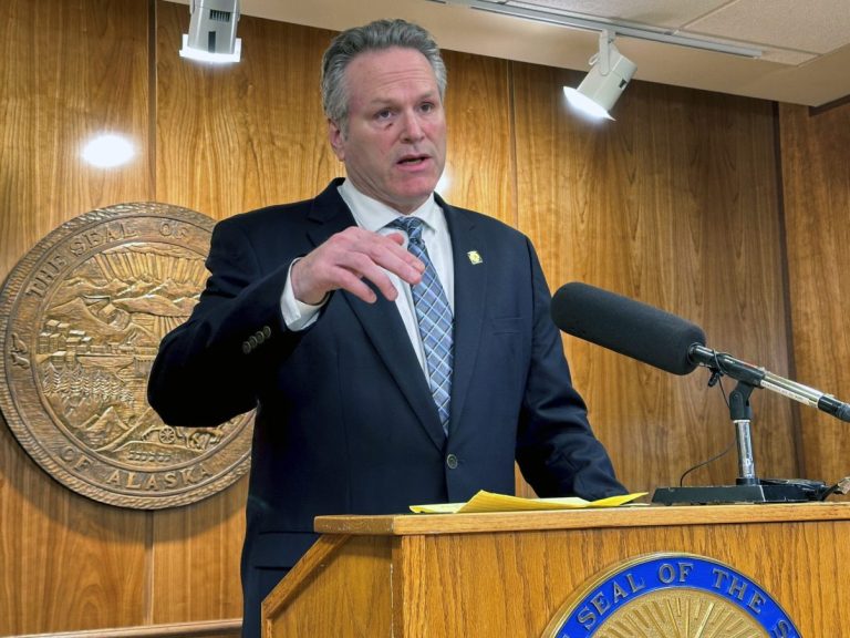Alaska Gov. Mike Dunleavy speaks to reporters on Friday, March 15, 2024, in Juneau, Alaska. His news conference came after his veto late Thursday of an education package that had been overwhelmingly passed by lawmakers.