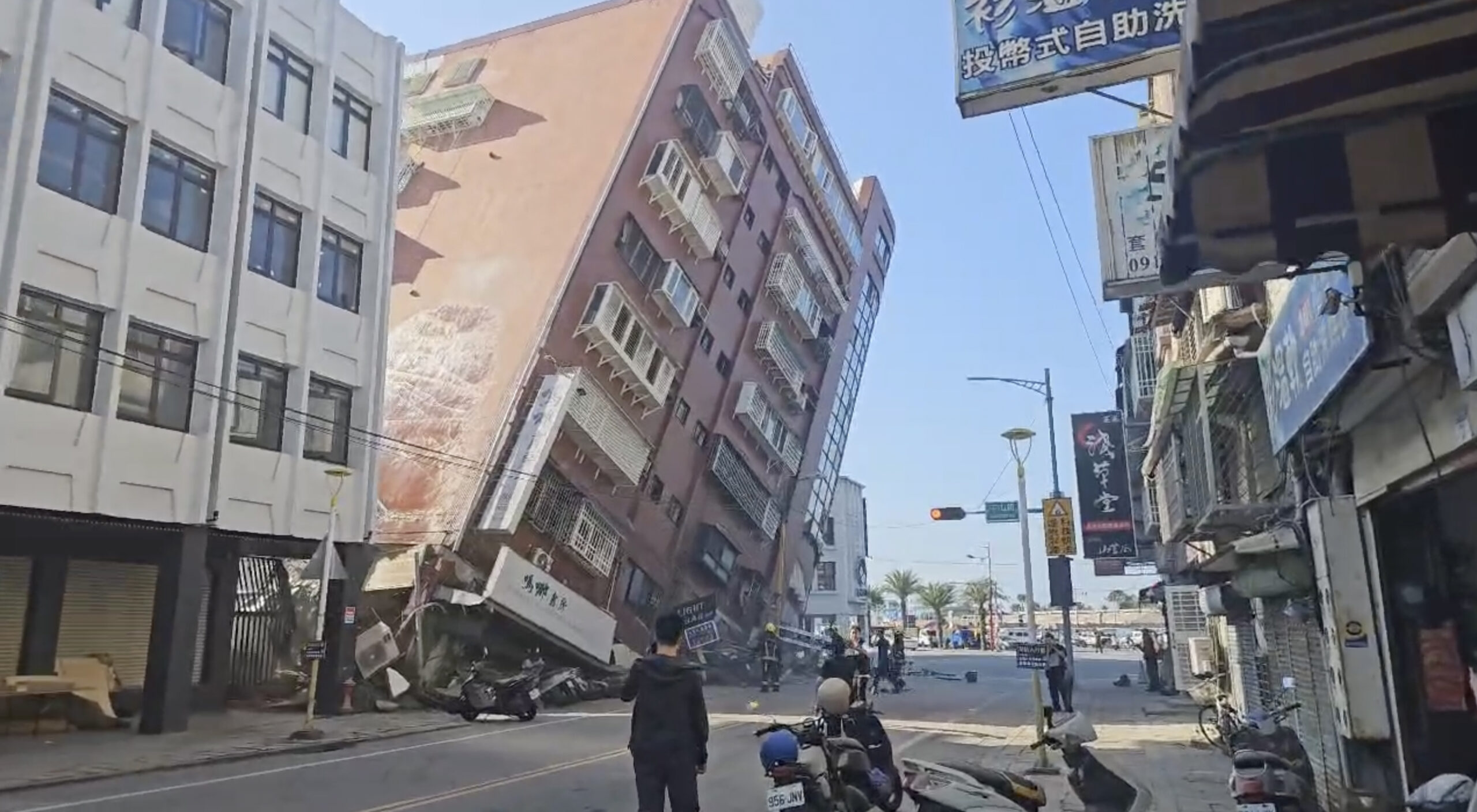 A strong earthquake shakes Taiwan, damaging buildings and causing a tsunami
