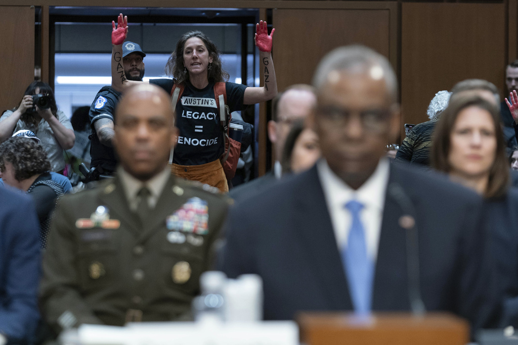 Protesters disrupt Lloyd Austin testimony as secretary denies genocide in Gaza