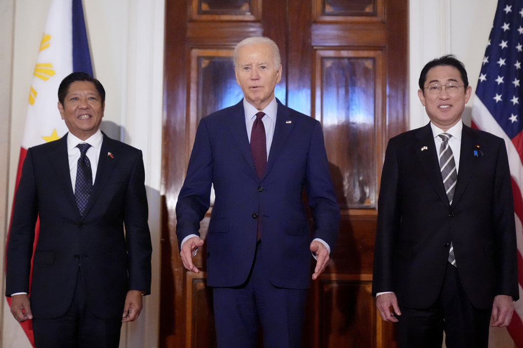 Biden hosts first-ever trilateral summit with Japan and Philippines