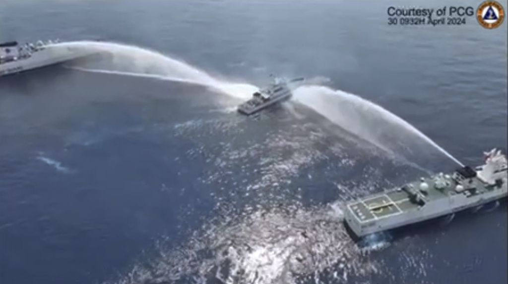 Xi Jinping complicates France state visit with water cannon attacks in the Philippines