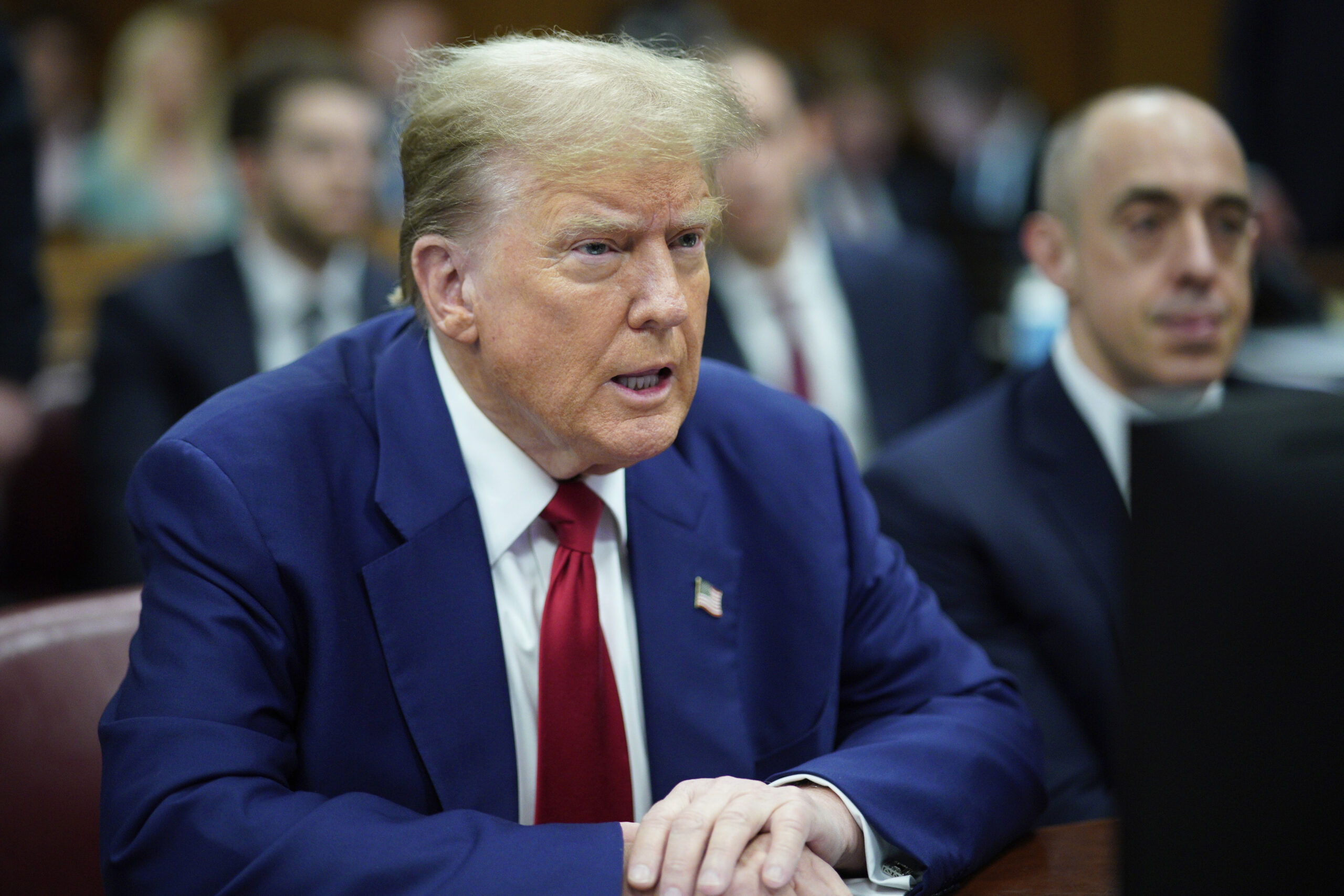 Trump held in contempt for violating gag order in hush money trial