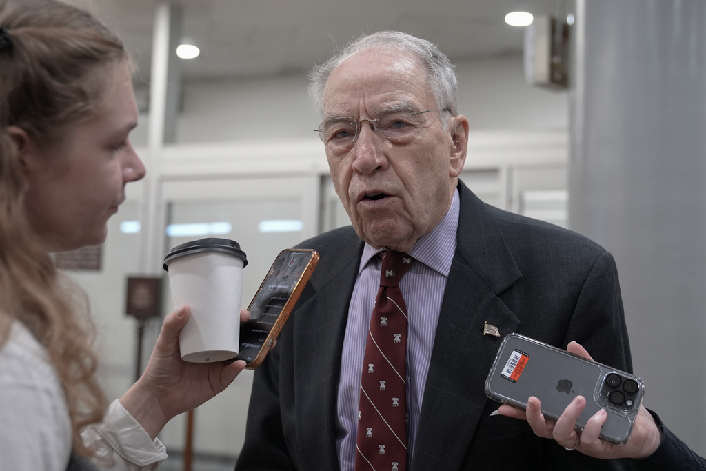 IG ousted by Biden pushes back on removal with an assist from Grassley