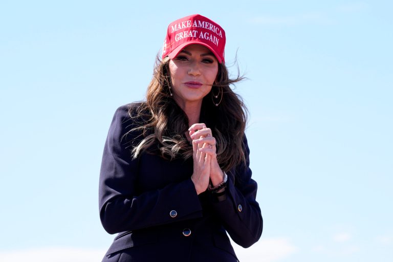South Dakota Gov. Kristi Noem gestures to the crowd prior to remarks from republican presidential candidate and former President Donald Trump at a campaign rally Saturday, March 16, 2024, in Vandalia, Ohio.
