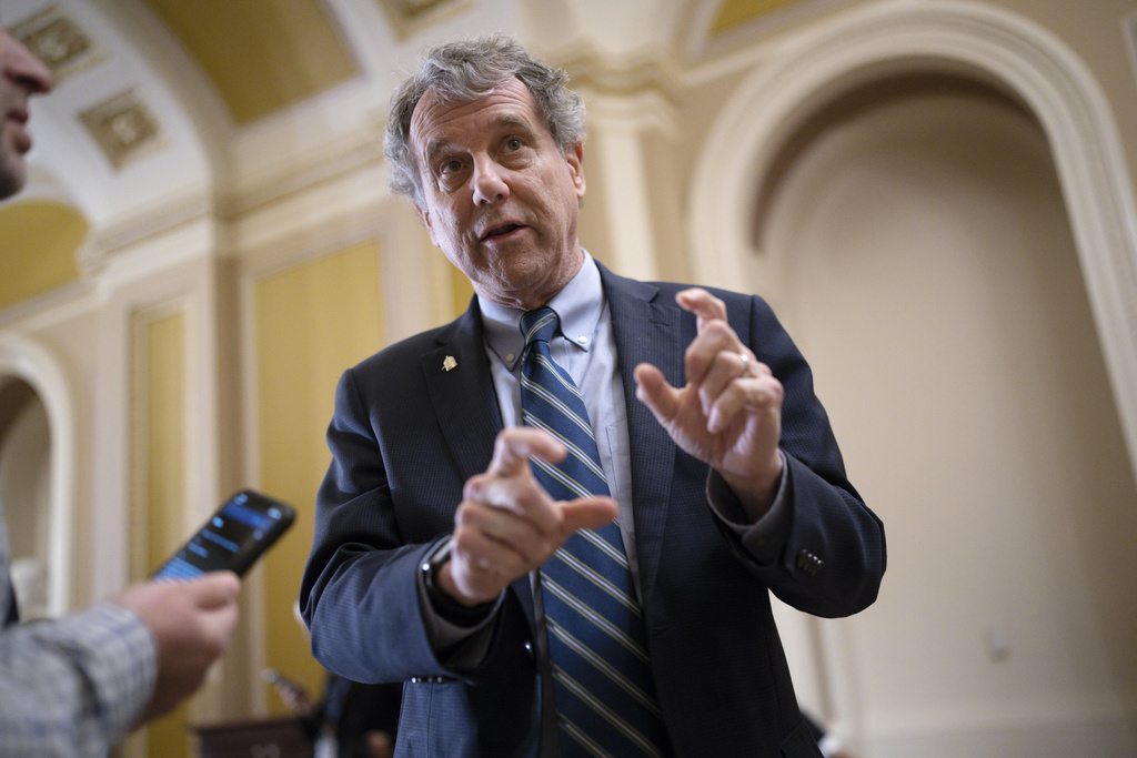Sherrod Brown, with taste for luxury chauffeurs, hits Jon Husted for allegedly not driving his own car