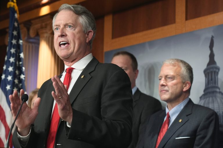 Sen. Roger Marshall (R-KS), left, with several of his Senate colleagues discuss during a news conference how the Biden administration's upcoming sanctions on America's ability to produce oil and critical minerals weaken America's energy security and embolden enemies on Capitol Hill Thursday, April 18, 2024, in Washington.