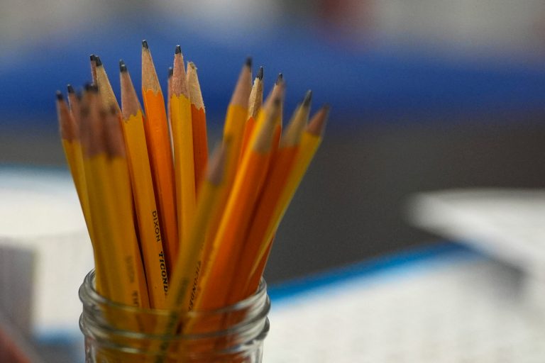 Pencils rest in a jar beside where students are working, at A.D. Henderson School in Boca Raton, Fla., Tuesday, April 16, 2024.