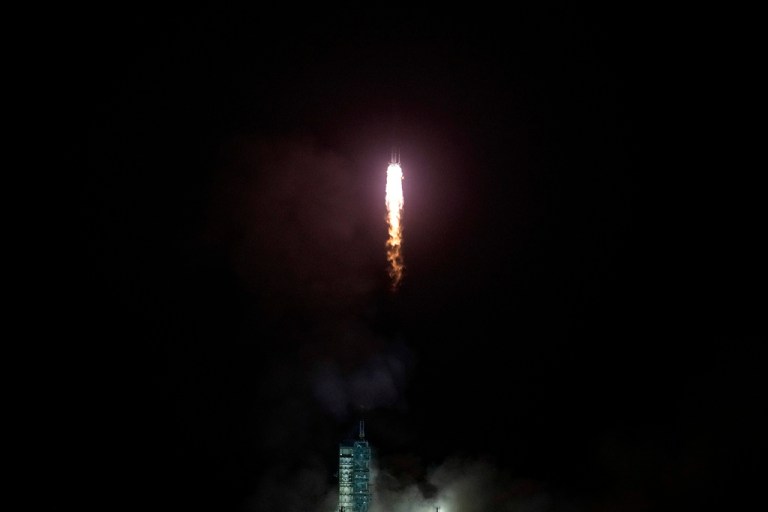 A Long March rocket carrying a crew of Chinese astronauts in a Shenzhou-18 spaceship lifts off at the Jiuquan Satellite Launch Center in northwestern China, Thursday, April 25, 2024.