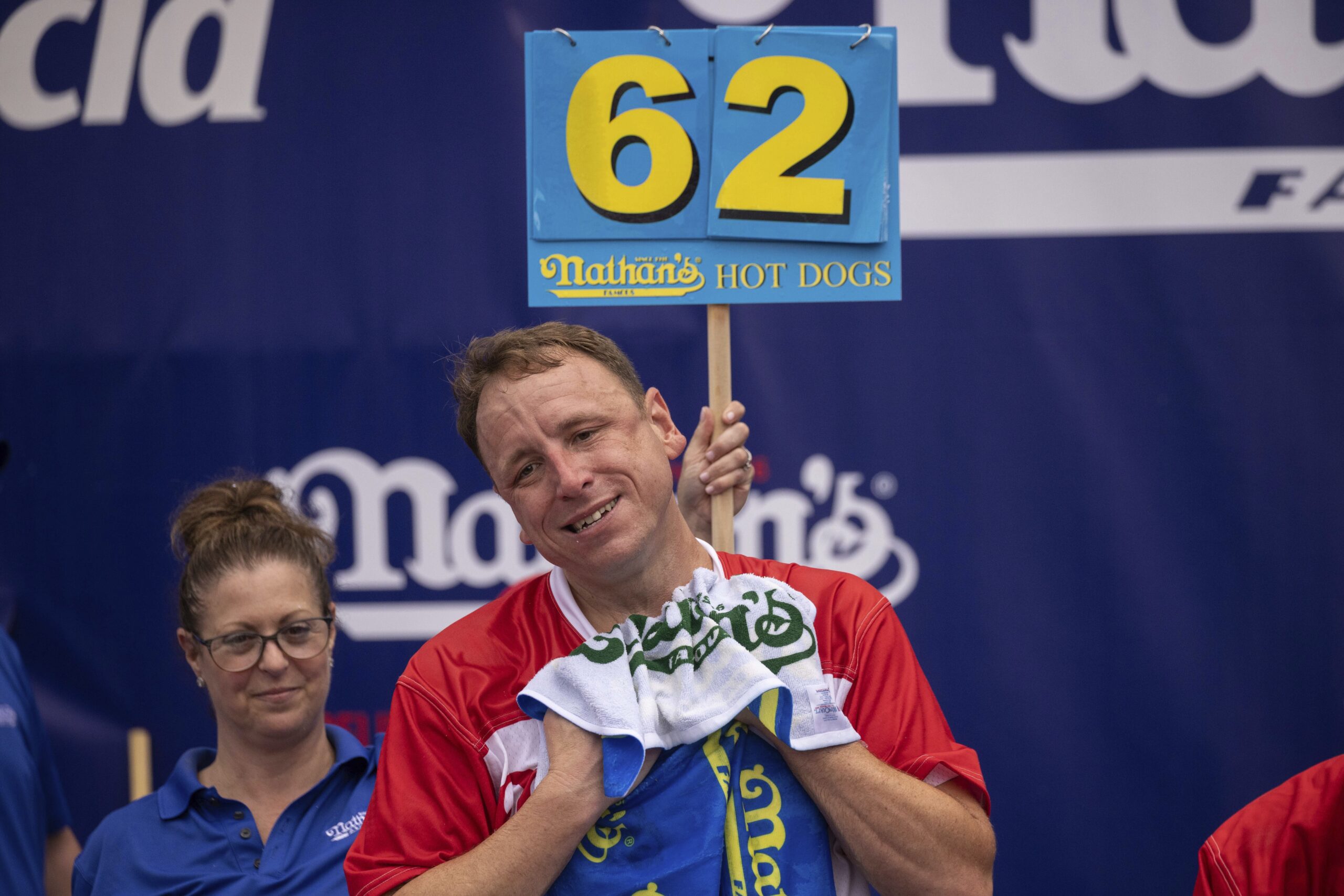 Joey Chestnut and soldiers compete in July Fourth hot dog eating contest at Army base
