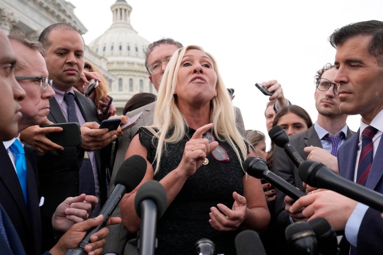 Rep. Marjorie Taylor Greene (R-GA) joined by Rep. Thomas Massie (R-KY) speaks to reporters after she tried and failed to oust House Speaker Mike Johnson (R-LA), her long-shot effort swiftly and resoundingly rejected by Democrats and Republicans tired of the political chaos, at the Capitol in Washington, Wednesday, May 8, 2024.