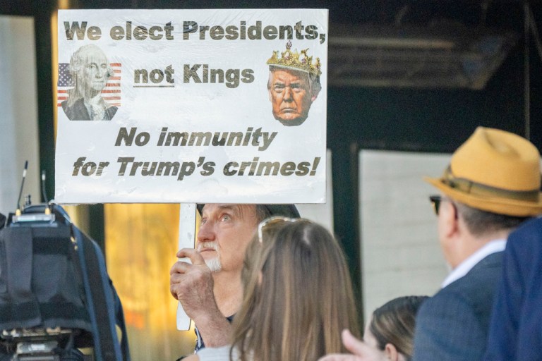 Protesters outside Capitol Hill Club heckle attendees ahead of Trump visit