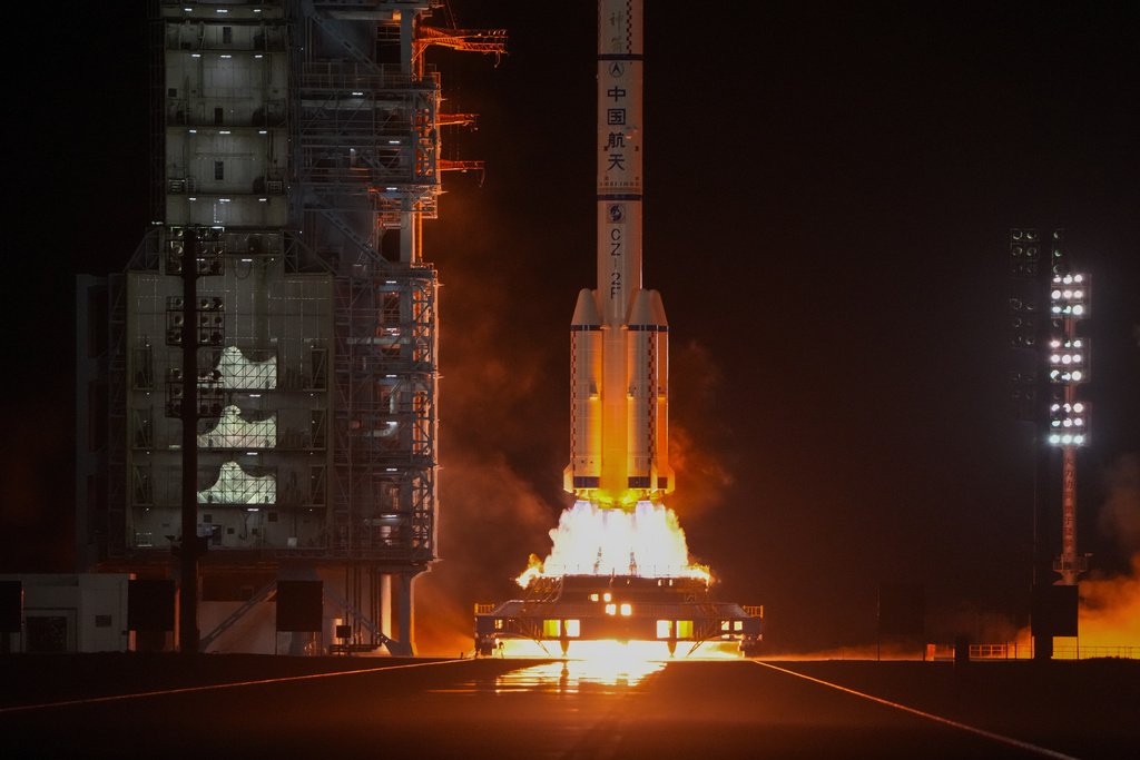 China displays flag on moon after lunar spacecraft landing