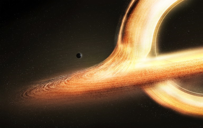 Scientists say brightening galaxy could be black hole with mass of a million suns