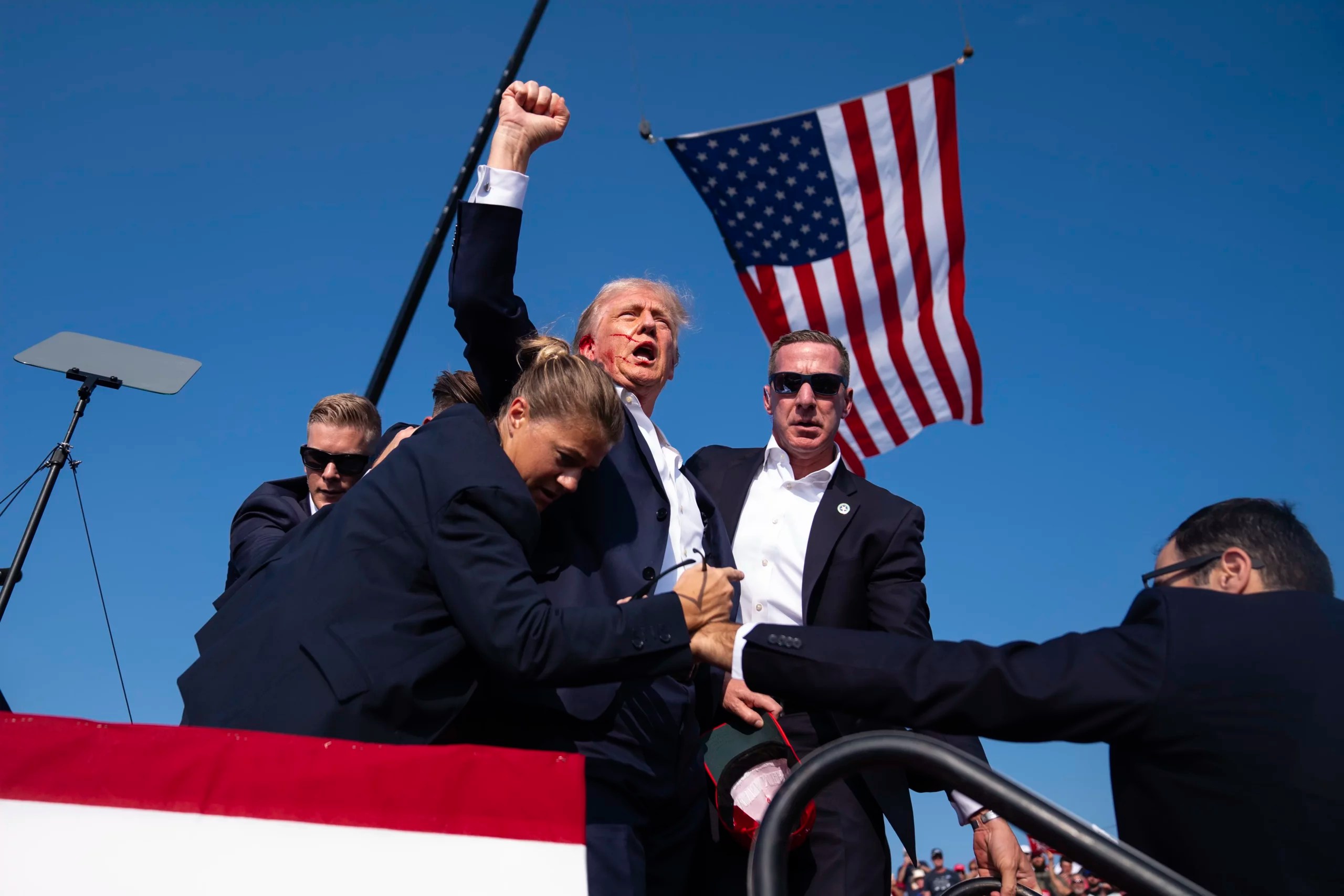 Trump high-top sneakers featuring assassination attempt photo sell for $299
