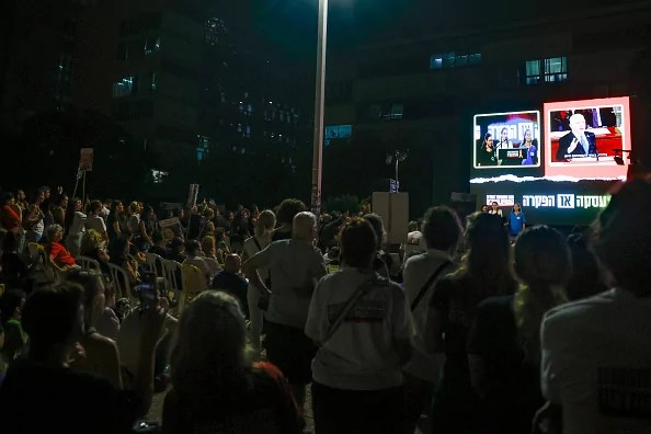 As families of hostages watch Netanyahu, how many are believed to be alive in Gaza?