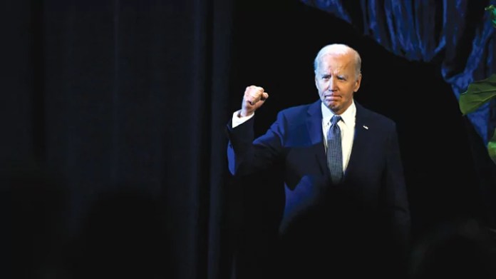 The tensions between Biden’s soaring democratic rhetoric and reality