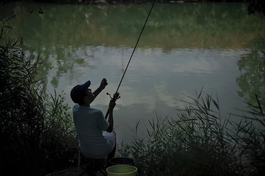 Wisconsin ends ban on carrying firearms while fishing