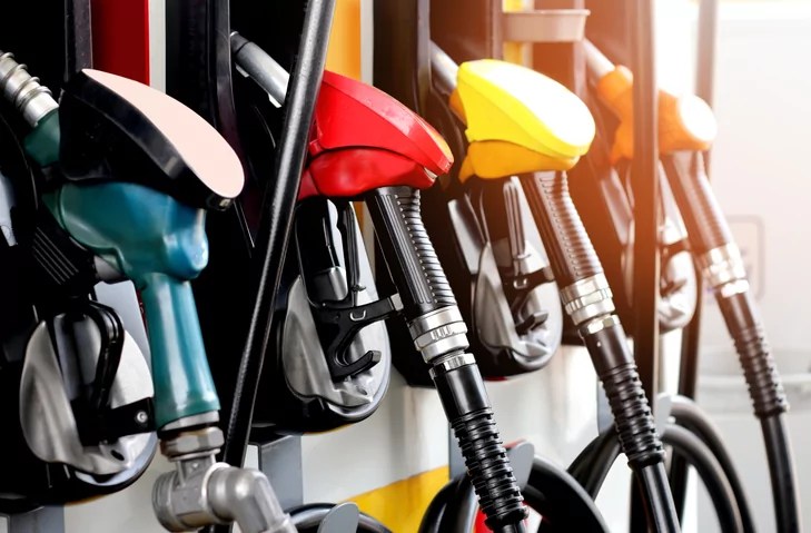 Red, green, yellow, and orange color fuel gasoline dispenser background.