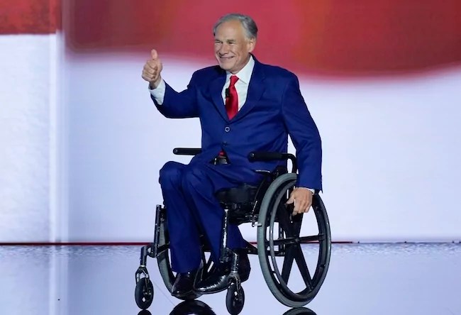 Gov. Greg Abbott (R-TX) gestures to supporters during the Republican National Convention on Wednesday, July 17, 2024, in Milwaukee.