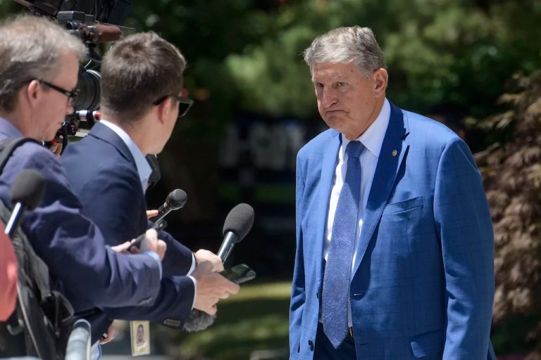 Manchin points finger at hard Left for keeping Biden in race for president