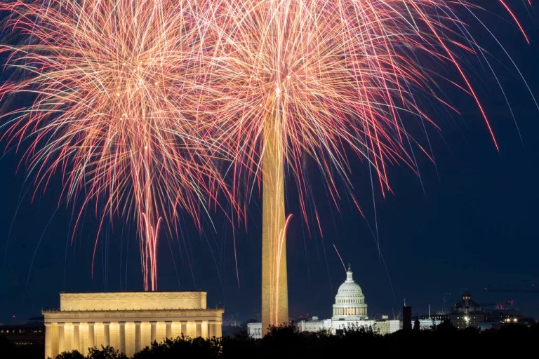 Fireworks burst above the National Mall, and from left, the Lincoln Memorial, Washington Monument and the U.S. Capitol building during Independence Day celebrations in Washington, late Tuesday, July 4, 2023.