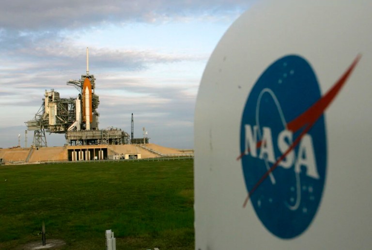After being moved from the Vehicle Assembly Building, space shuttle Endeavour rests on launch pad 39b at the Kennedy Space Center in Cape Canaveral, Florida, Wednesday, July 11, 2007. A NASA camera, in the housing , right, will record the scheduled Aug. 7, launch.