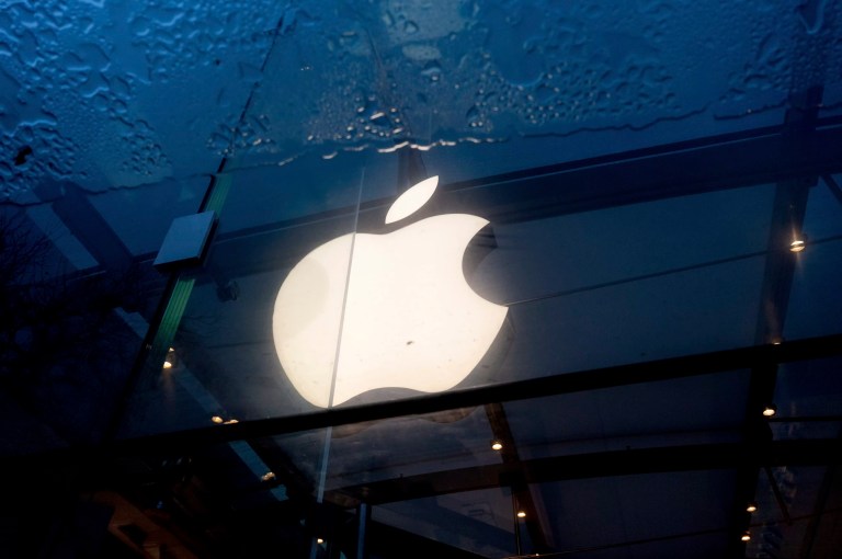 An Apple logo hangs at a Palo Alto, California, Apple store on Friday, Feb. 2, 2024.