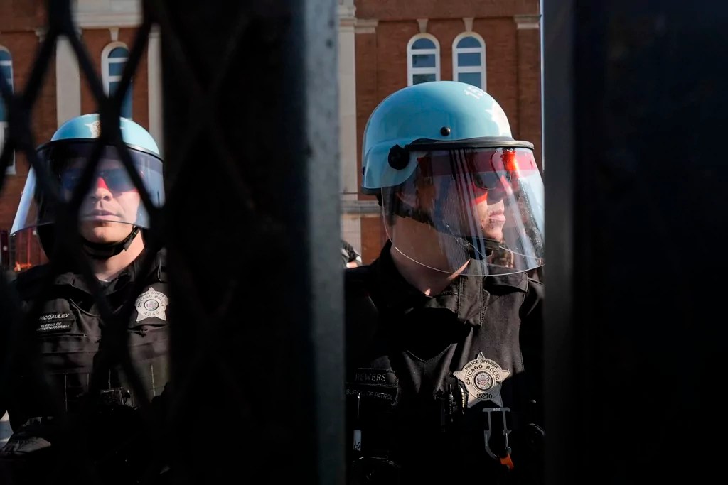 Police engaging protesters at DNC perimeter