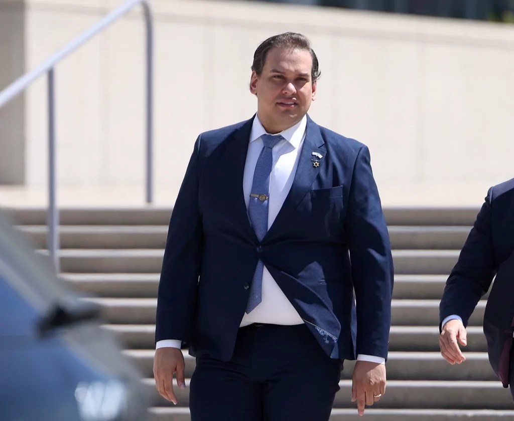 Santos says he will ‘explore a way to make it right’ with fraud victims