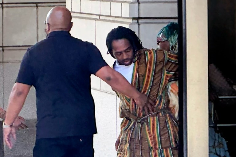 District of Columbia Councilman Trayon White, Sr., center, walks out of the federal courthouse after his initial appearance, Monday, Aug. 19, 2024 in Washington. White was arrested on a federal bribery charge by the FBI on Sunday.
