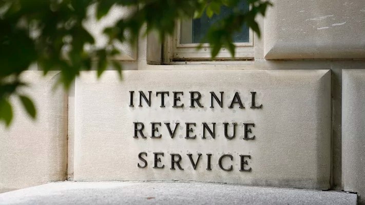 A sign outside the Internal Revenue Service building is pictured, May 4, 2021, in Washington.
