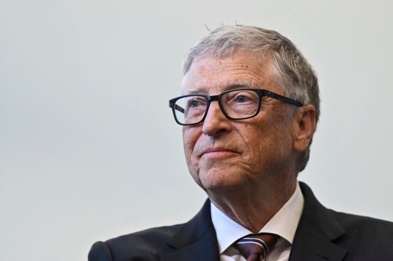 Bill Gates reacts during a visit with Britain's Prime Minister Rishi Sunak at the Imperial College University, in central London, Feb. 15, 2023.