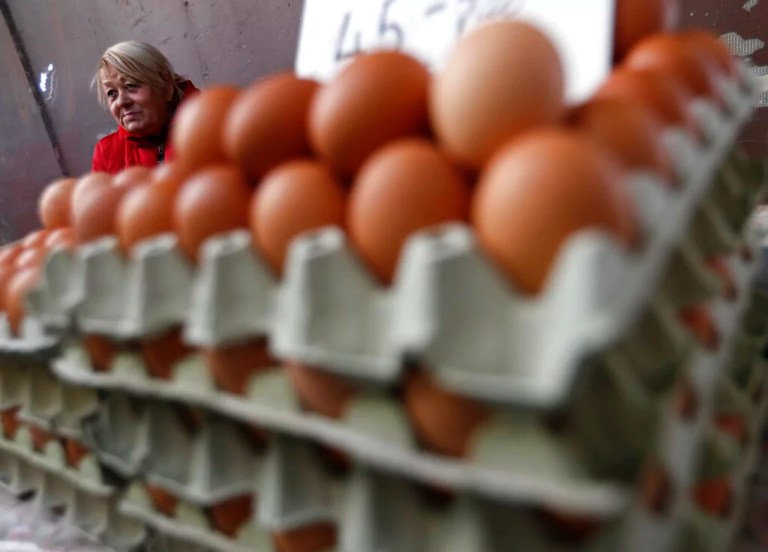 Vendor Judit Sos sells eggs in a food market in Budapest, Hungary, Nov. 20, 2021.
