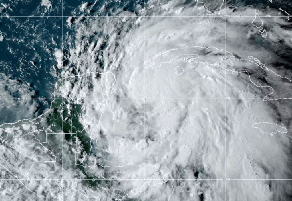 Hurricane Helene downgraded to tropical storm as it batters Atlantic coast