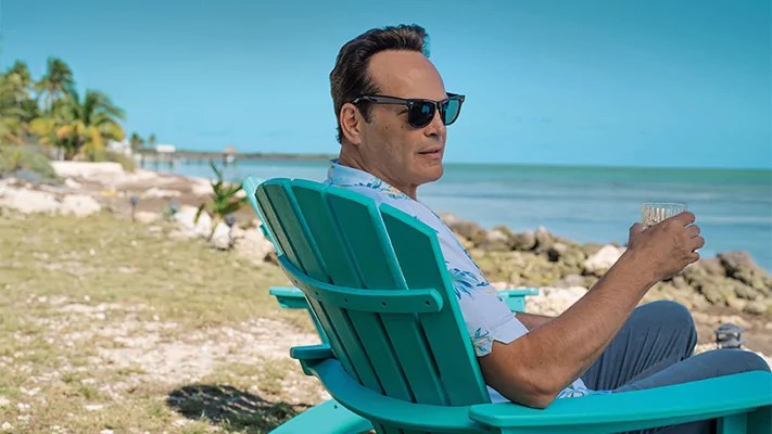 Good vibes, murder, and a monkey make for a satisfying Carl Hiaasen adaptation