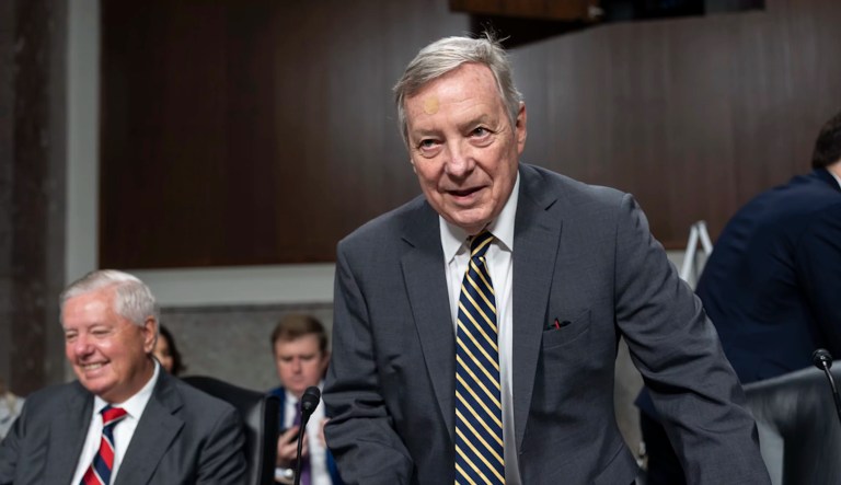 Senate Judiciary Committee Chairman Dick Durbin (D-IL) center, joined by Sen. Lindsey Graham (R-SC), left, the ranking member, arrives to lead a hearing on how to stem the rise in hate crimes in America, at the Capitol in Washington, Tuesday, Sept. 17, 2024.