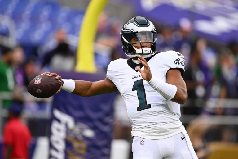 Philadelphia Eagles quarterback Jalen Hurts throws during a pregame warm-up before an NFL football game against the Baltimore Ravens, Friday, Aug. 9, 2024, in Baltimore.